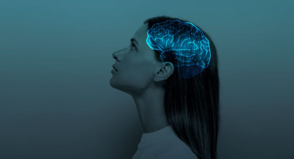 Persona en estado de calma representando la regulación del sistema nervioso y el bienestar integral